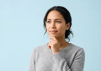 women-thinking-holding-chin